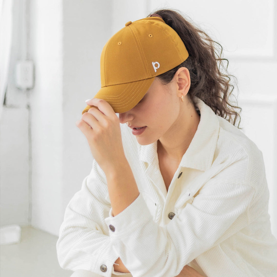 Baseball hat with ponytail attached online